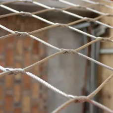 Сетка нержавеющая тросовая с параллельным узловым креплением и ромбической ячейкой Н1 7х7 AISI 316 20х35х1 мм